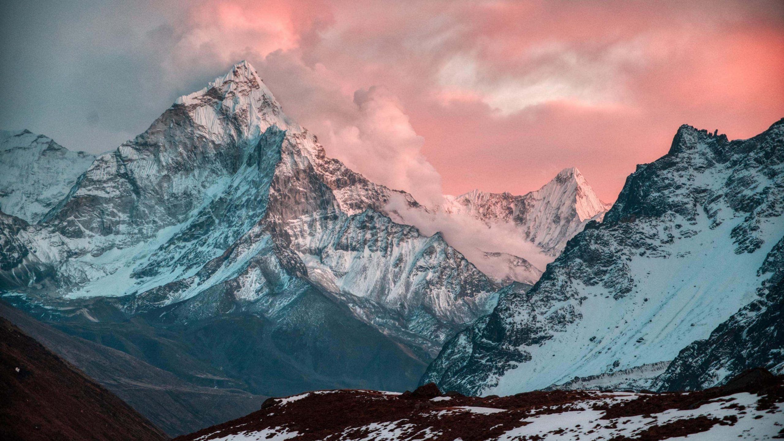 Ama Dablam glowing under pink sunset clouds