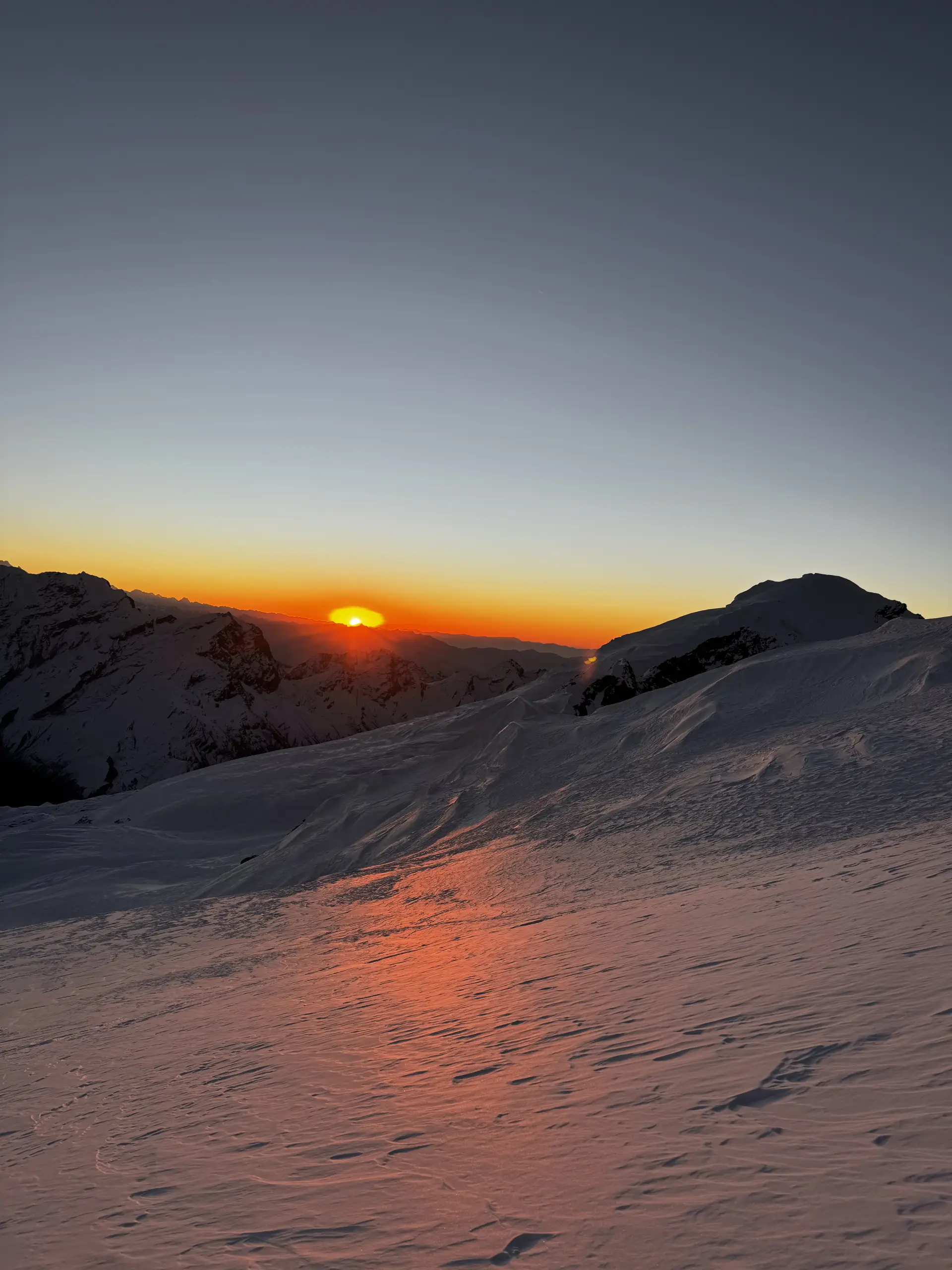 Sunrise over the clouds from high camp on Mera Peak