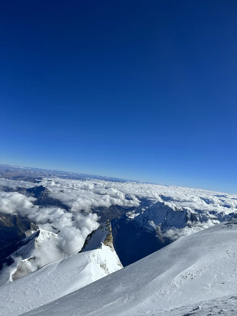 View down from Manaslu over a sea of clouds