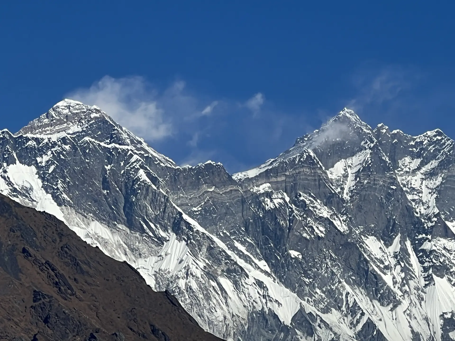 Everest, Nuptse and Lhotse ridge under a deep blue sky