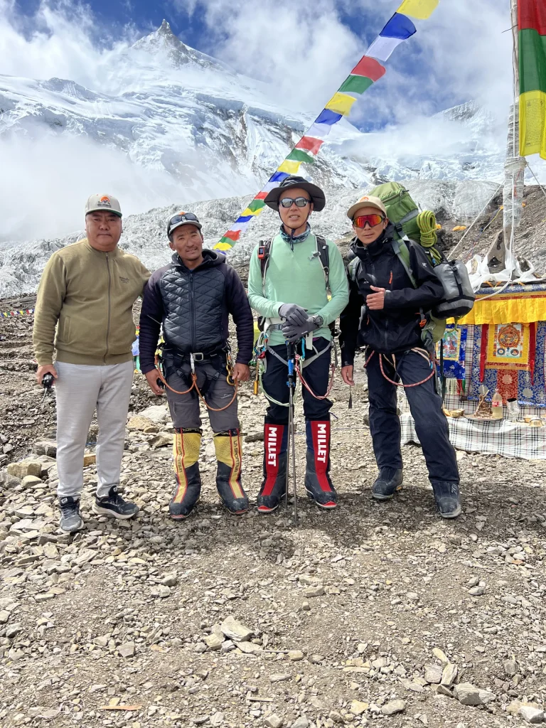 Climbers and Sherpa guides at Manaslu Base Camp