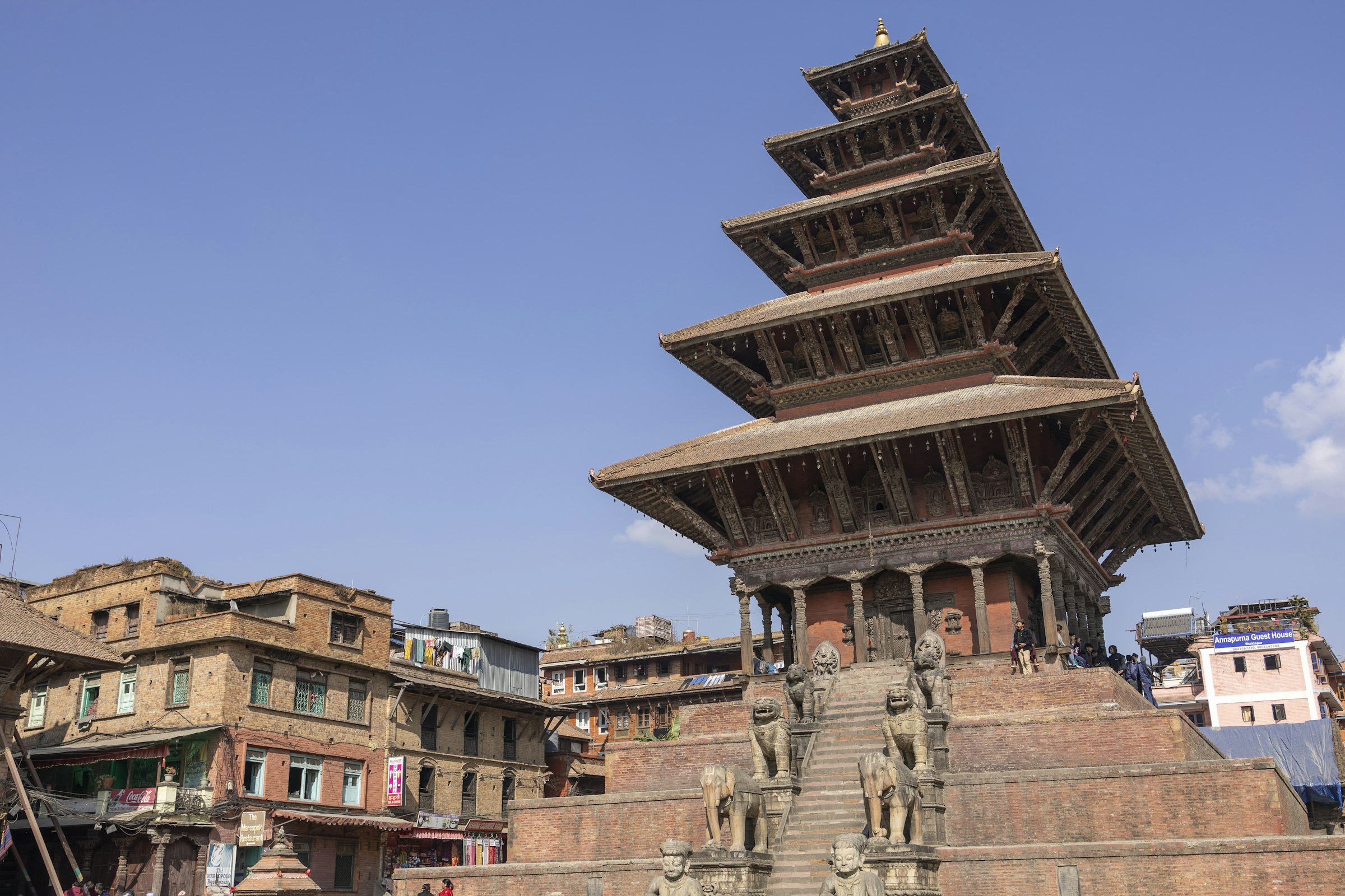 Five-tiered Nyatapola pagoda rising above its stone stairway and guardian statues in Bhaktapur