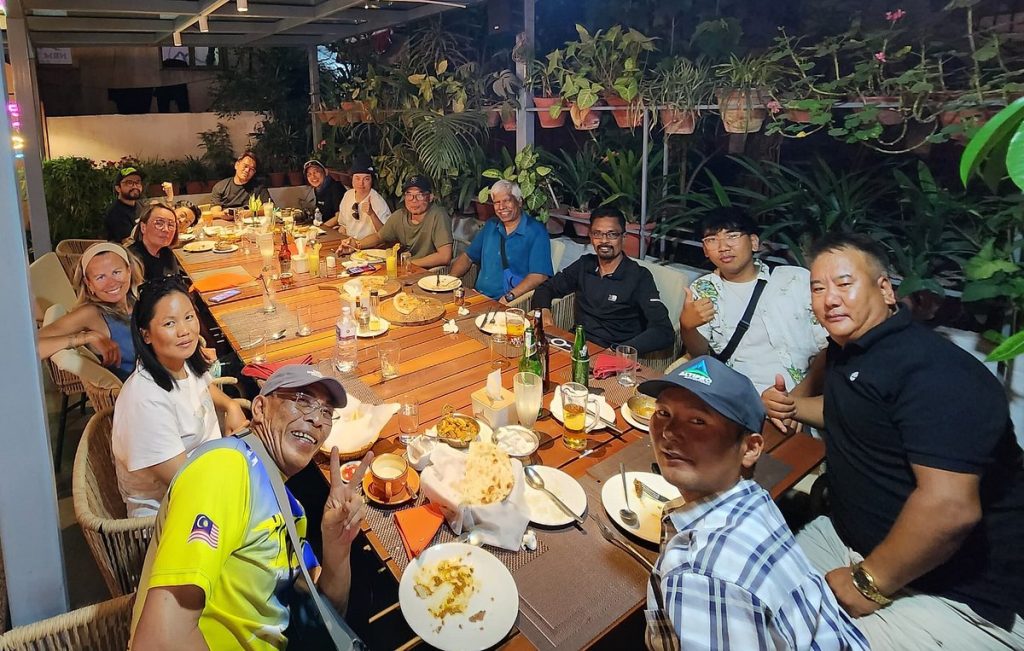 Malaysian Everest expedition film crew sharing dinner with the Nima Adventure team in Kathmandu
